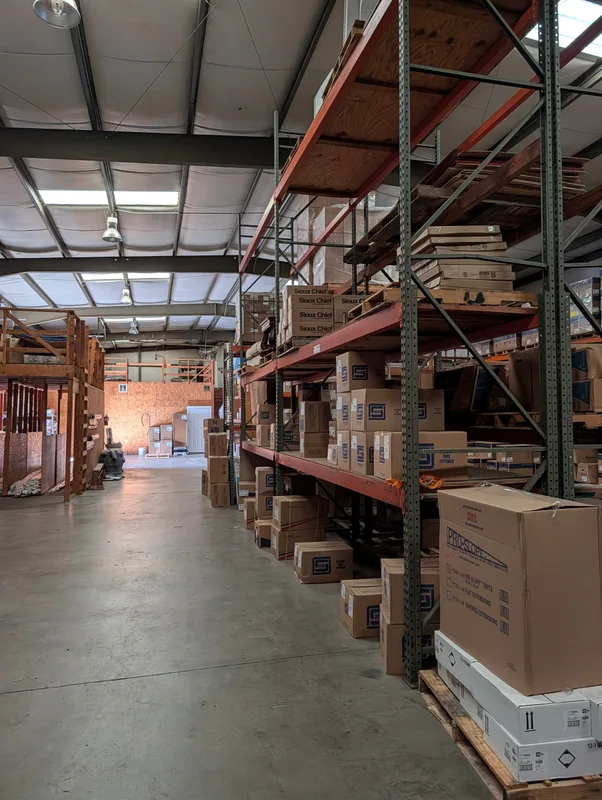 A long aisle of pallet racks in the warehouse